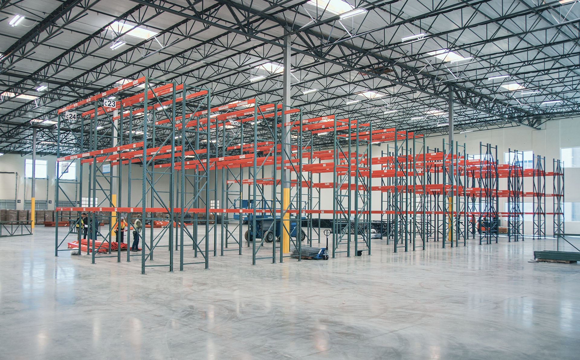 Selective pallet rack bays loaded with palletized goods