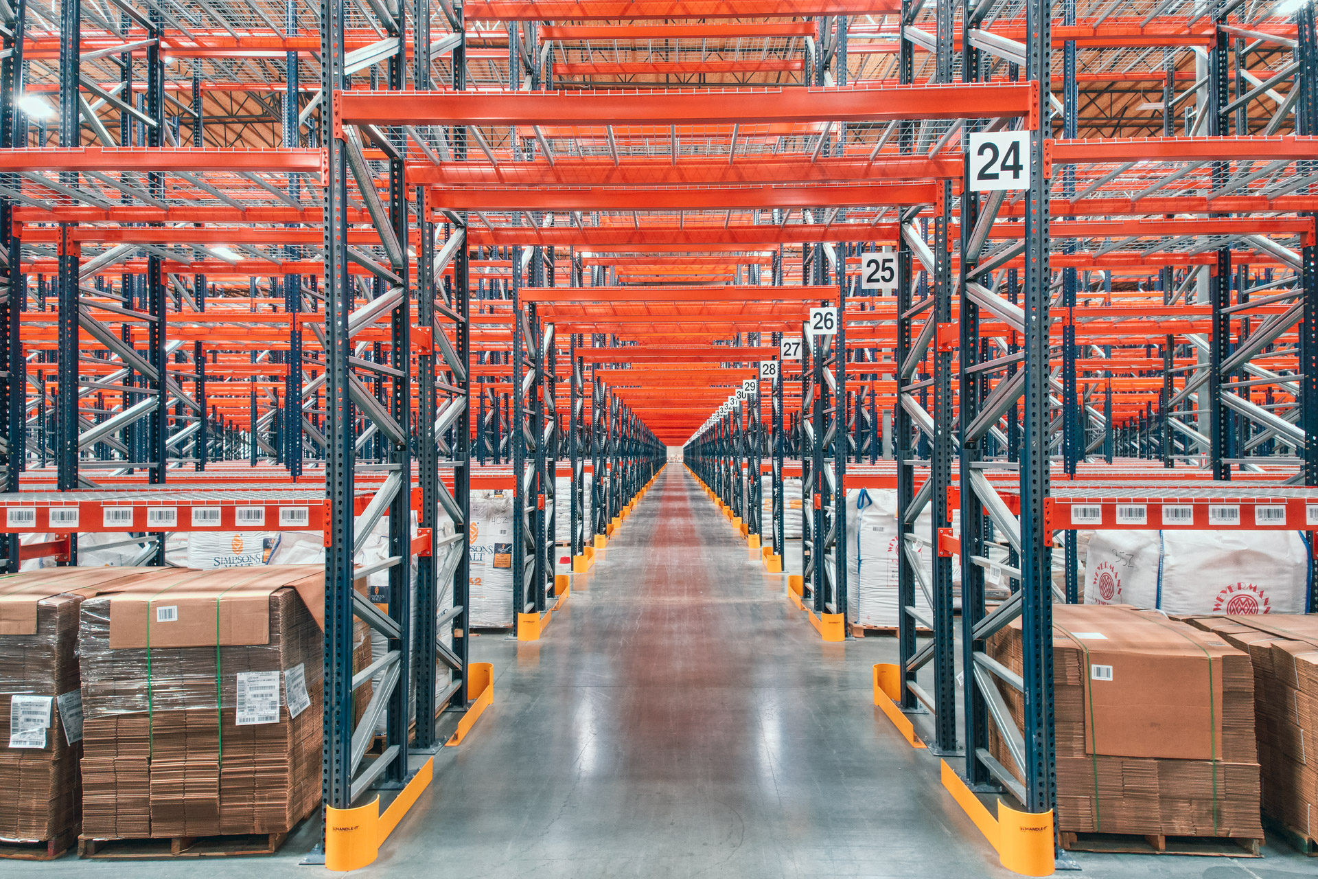 Warehouse aisle lined with pallet rack